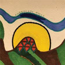 Chocolate Hills, The Orb - Yarns From The Chocolate Triangle (Peanut Chocolate Vinyl) - Cooking Vinyl Limited