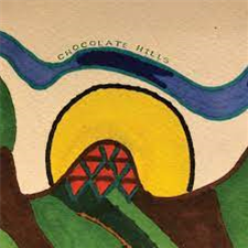 Chocolate Hills, The Orb - Yarns From The Chocolate Triangle (Peanut Chocolate Vinyl) - Cooking Vinyl Limited Chocolate Hills, The Orb - Yarns From The Chocolate Triangle (Peanut Chocolate Vinyl) - Cooking Vinyl Limited